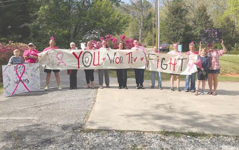 Friends and colleagues of Becky Griffin greeted her as she came home from her last radiation treatment in April with a hero’s welcome.