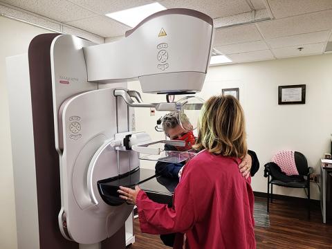 Renee S. Tice, Mammography Technologist at Habersham Medical Center helps a patient receive a mammography examination.