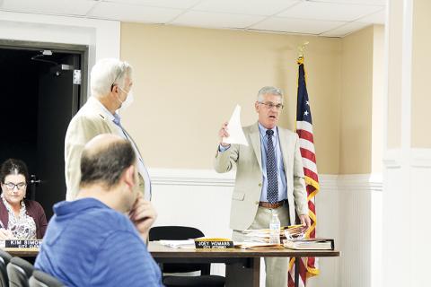 City attorney Joey Homans speaks at the Demorest City council meeting Tuesday night regarding the security agreement with Habersham County Medical Center. Voices were raised as Dr. Hendrix’s attorney Abe Sharony interjected during the meeting. ERIC PEREIRA/Staff