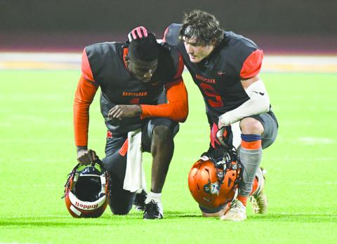 Habersham Central’s Gage Hurt (9) consoles teammate Joshua Pickett after Friday’s loss to White County. Despite the loss, these Raiders have a lot to feel good about at this point in the season. TOM ASKEW/Special