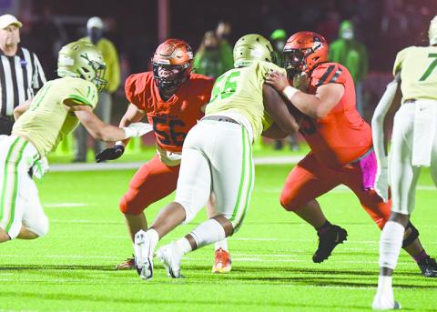 The Raiders’ running game revolves around three good backs behind a strong offensive line that includes Butch Cassidy (56) and Ethan Tomlin (53). TOM ASKEW/Staff
