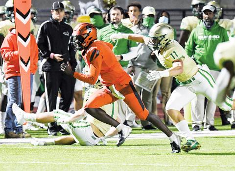 Habersham Central’s Joshua Pickett escapes a Buford defender earlier this season. TOM ASKEW/Special