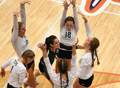 Tallulah Falls’ volleyball team celebrates a point during their win Tuesday. BRIAN CARTER/Special