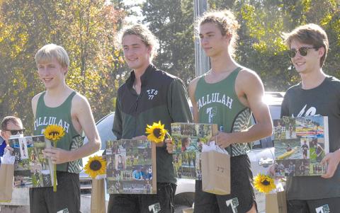 From left are Tallulah Falls senior runners Collin Kelly, Eli Sims, Grey Bourlet and Chaz Mullis, who were recognized at Tuesday’s home meet. BRIAN CARTER/Special