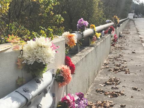 Members of the Clarkesville community left flowers on the Homer Sutton Bridge on Highway 197 in memory of Shane Justice earlier this week.