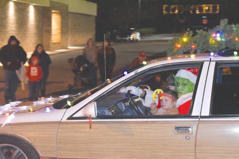 Joel Alexander and daughter Laikyn channel the Grinch and his pal Max. 