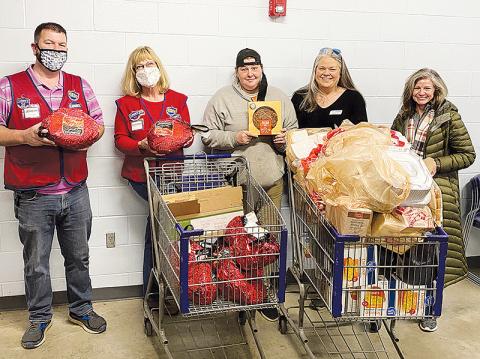 Shown (from left) are Lowe’s Cornelia Store Manager Jeremy Gattis, Lowe’s Cash Management Specialist Marianne Longerbone, Family Resource Center Home Visiting Coordinator Melanie Allen, volunteer Cynthia Wade and Family Resource Center Board Member Leigh Johnson. MELANIE ALLEN/Submitted