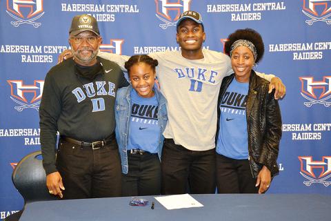 Habersham Central’s Joshua Pickett is joined at his signing ceremony Wednesday by his dad Harold, sister Kaylin and mom Angelia.