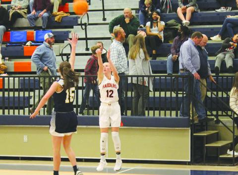 Habersham Central’s Kelsey Banks launches a shot against Prince Avenue Christian before the Christmas break.
