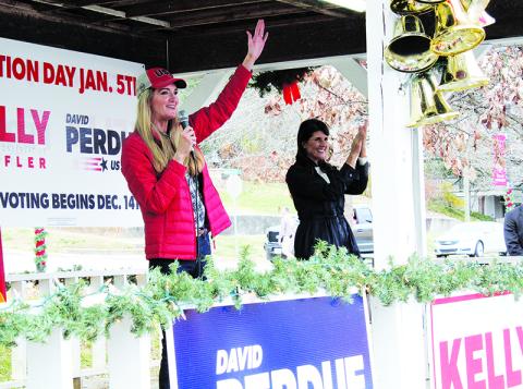 U.S. Sen. Kelly Loeffler waves acknowledges applause from a crowd of 250-plus on the second stop of her statewide firewall tour Sunday in Demorest. Loeffler was joined by former U.N. Ambassador Nikki Haley (right) for each of her stops throughout the day.