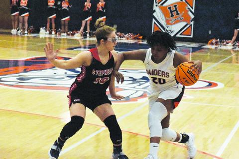 Habersham Central's Nykerriah Brown looks to shed a defender during the Lady Raiders' first game against Stephens County Dec. 4. 