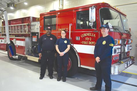 Cornelia Fire Chief Billy Jenkins stands inside the new fire station on the south end of the city along with firefighters Angela Martin and Christopher Bruce. 