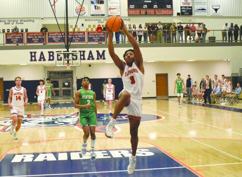 Habersham Central’s guard Malachi Dooley elevates for a layup against Buford in December.