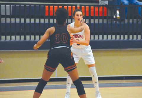 Addie Penick looks to make a play in a recent Lady Raider victory over Lanier. HCHS fell Tuesday night to region-leader Buford 49-36 in a contest that came down to the fourth quarter.