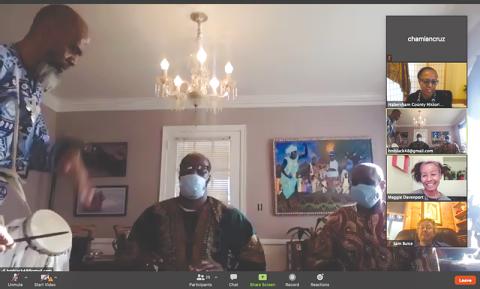 Harun Black, left, plays the kutiro drums along with his son Jahbri Black and Raymond Simmons in this screenshot of the 2021 MLK Day Virtual Celebration. They are part of a group called Bantaba East. The kutiro drums are originally of the Mandinka people of The Gambia, West Africa. They have been drummers for 30 years.