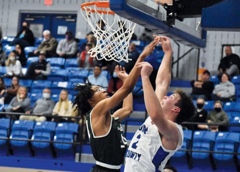Tallulah Falls’ Julian Gober blocks Towns County’s Jake McTaggart during a Dec. 3 game. The Indians have not lost since that night 50 days ago.