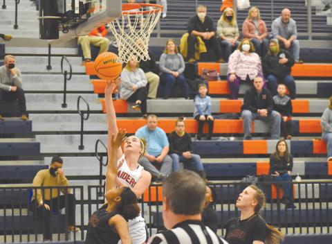 Habersham Central’s Taylor Wade drives to the hoop during Friday night’s win over Lanier.