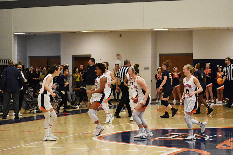 Habersham Central Lady Raiders players celebrate after their win over Dacula
