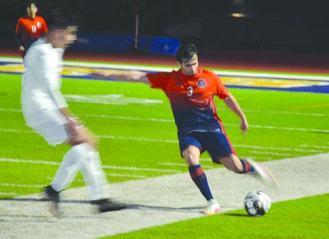 Habersham Central’s Angel Zavala boots the ball downfield during Tuesday night’s win over Gainesville.