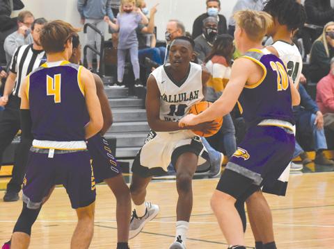 Tallulah Falls' Simeon Respress weaves through traffic during the Indians' win over Athens Christian.