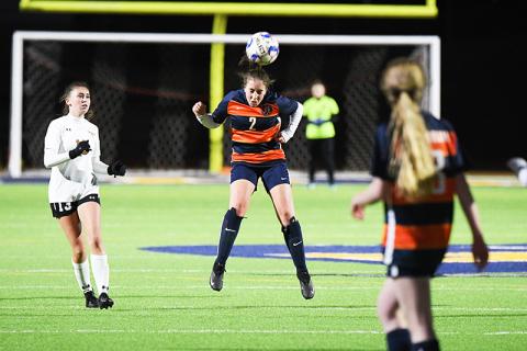 Habersham Central’s Ryalie Acker heads the ball during Friday’s match against Lanier. TOM ASKEW/Special
