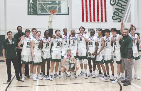 Tallulah Falls captured its first region championship in program history Wednesday night, beating George Walton 64-47. Pictured are (front) Kale Corbett, (back from left) head coach Cody Coleman, assistant coach Lowell Hamilton, Colton Hicks, George Ketch, Lincoln Hall, Simeon Respress, David Rodriguez, Anfernee Hanna, Sammy Davis, Gabe Keene, Devonte Allen, Julian Gober, Diego Crotta, Bryan Cope, assistant coach Matt Crotta and Charlie Cody.