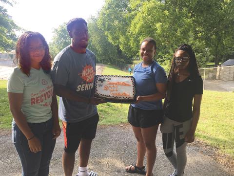Former Habersham students (from left) Traci Hodges, Michael Babers, Mikaela Hudson and Julianna Teasley celebrate their graduation four years ago. The students are among many that Tammy Teasley (below photo with husband Anthony) has helped advise over many years of being a helpful hand for youth in her community.