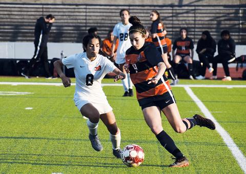 Habersham's Anna LaBarbera tries to beat a defender in an earlier home game.