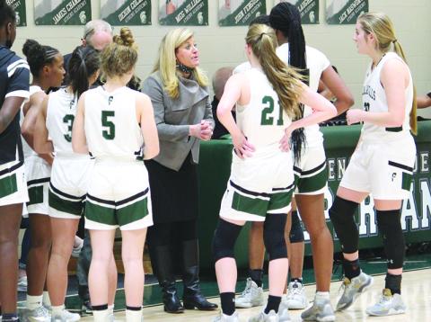 Coach Brandy Corbett talks to her Tallulah Falls team during a game this season.
