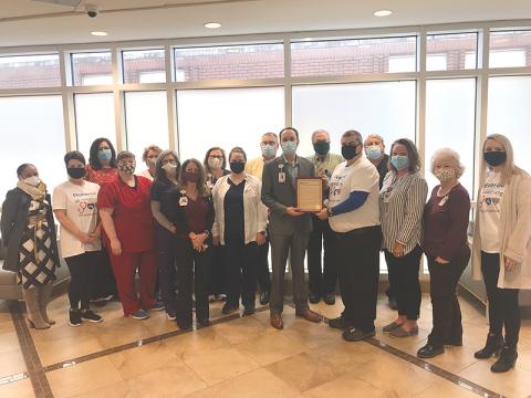From left, Kesha Clinkscale, VP, Culture & Wellness; Demorest City Manager Kim Simonds; Valeria Lewis, Sara Black, Karen Phillips, Acute Care Manager; Jamie Mentzer, Angela Harpold, COO; Crystal Corbin; Samantha Ramey; Michael Armstrong, Director of Operations; Tyler Williams, CEO; Demorest Councilman Shawn Allen; Jeffrey Laird, Accounting Manager; Dee Dillin, Radiology Manager; Lisa Ferguson, Lisa Ferguson, Patient Services; Barbara Payne, Patient Services; and Demorest utility clerk Megan Chastain. 