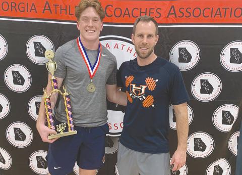 Habersham Central’s Pierce Vickery won a state title in weightlifting with the guidance of coach Tip Johnson.