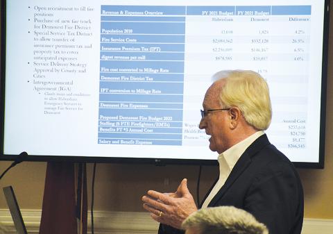 Habersham County Manager Phil Sutton talks to the Demorest City Council about the possibility of merging fire protection services.