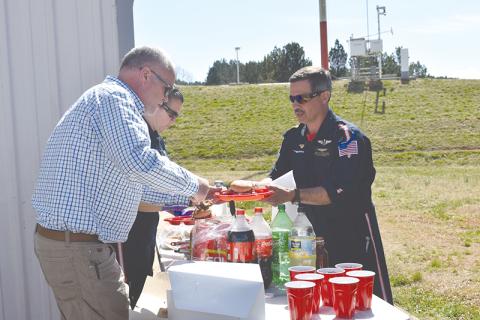 Master Flight Paramedic Frank De Armas (right) was honored on Friday for his 20 years of service, which is a rare accomplishment in the industry. 