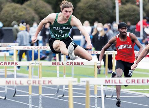 Tallulah Falls’ Grey Bourlet runs the hurdles at Mill Creek.