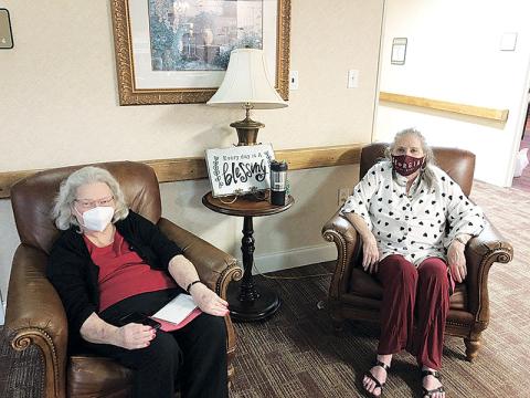 The Oaks-Scenic View Assisted Living in Baldwin was one of 44 assisted living facilities in Georgia to receive Pinnacle Quality Insight’s Customer Experience Award in 2020 recognizing it for exemplary customer service in a variety of areas. Here, residents Nancy Mangum (left) and Karen Craven relax in one of the sitting areas around the facility.