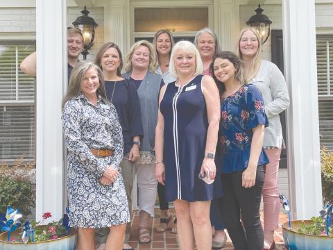 Shown from left to right, back row is Justin McKinney, Suzanne Dow, Lisa Nicholson, Candice Holcomb, Melanie Allen, and Aly Johnson. Front row is FRC Board Chair Leigh Johnston, Executive Director Linda Johnson and Director of Operations Rebecca Glaze.