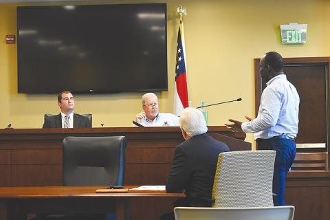 On Monday, Michael Baker International Project Manager Charles Adeogon, far right, discussed with the Habersham  Airport Commission how the price of steel is affecting its T-Hangar project. Airport commissioner Christopher Limbach, chairman Ken Schubring and County Manager Phil Sutton listen in.