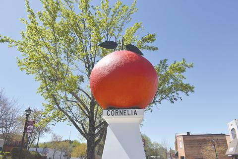 The Big Red Apple monument in Cornelia with its fresh coat of paint on Friday.