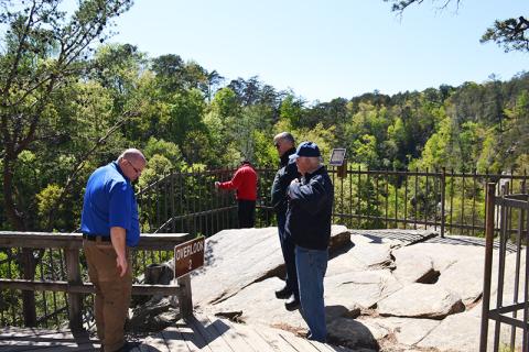 First responders check the scene of a woman's death near Outlook 2 in Tallulah Gorge State Park on Thursday afternoon. BRIAN WELLMEIER/Staff