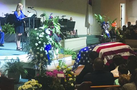 Madison Ball speaks about her love and fond memories of Caleb Griffis on Monday at Level Grove Baptist Church. Caleb died April 1 in a motorcycle accident.