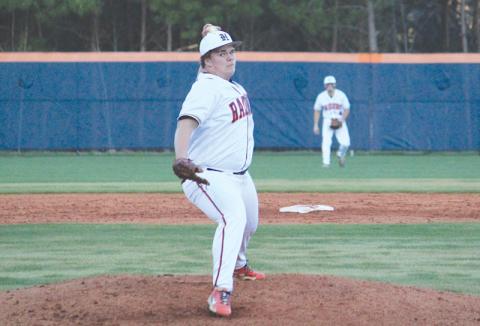 Habersham Central’s Hunter Tatum  delivers in Game 1 against Winder-Barrow on Monday.