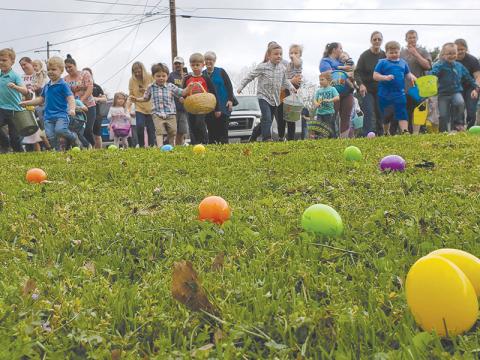 Children attending the egg hunt at the Clarkesville First United Methodist Church get ready to scramble for their multi-colored prizes on Saturday morning. SAMANTHA SINCLAIR/CNI News Service