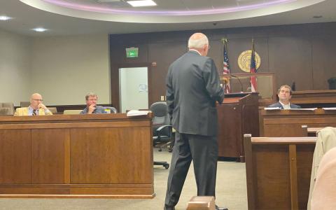 Cornelia attorney Doug McDonald presented the Habersham County Airport Commission on Monday with court documents of airport coordinator Steve Worley’s felony conviction. CHAMIAN CRUZ/Staff