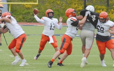 Habersham Central’s Quinton Sharpe gets protection from his offensive line during Wednesday’s spring scrimmage against Flowery Branch. TOM ASKEW/Special 