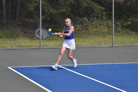 Abigail Brenner returns a shot Wednesday morning during Tallulah Falls’ tennis camp. ISAIAH SMITH/Staff 