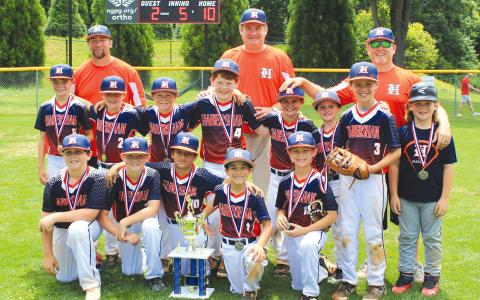 Team members are (front from left) Bentley Wood, Creed Jones, Marcos Machado, Mateo Machado, Ezekiel Wilkerson, Woods Irvin, Rylen Hammond, (middle) Lane Caudell, David Borrow, Brycen Hammond, Fenn NeSmith, Brooks York, Praythan Poole, (back) coaches Jarrod Bingham, Alan NeSmith and Brent Hammond.