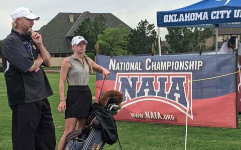 In the school’s first appearance at the NAIA National Championships last week, Truett McConnell senior Kiley Blackburn advanced to the final rounds as an individual, making her the first in program history to do so. Blackburn speaks to head coach Steve Patton during one of her rounds. SHAWN BLACKBURN/Submitted