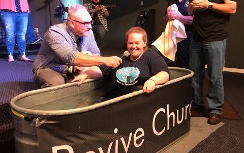 Cassie Kemp says she decided to get baptized after starting her recovery from addiction at Freedom Hill in Demorest. Above, Kemp is baptized at Revive Church. BECKY EASLEY/Submitted