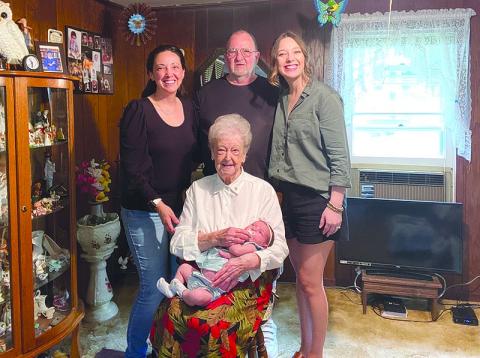 Joyce Jordan sits with new great great granddaughter Johana Lynch, surrounded by  granddaughter Misty Baird (left), son Dennis Jordan and great granddaughter Shelby Lynch.