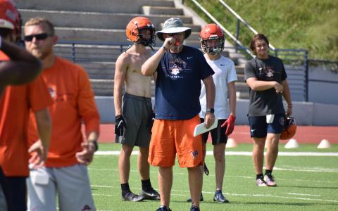 Habersham Central coach Benji Harrison blows his whistle for the next drill at workouts Thursday morning at Raider Stadium. The Raiders begin full practices on Monday, Aug. 2, with the scrimmage game set for Friday, Aug. 6, against North Oconee. MATTHEW OSBORNE/Staff 